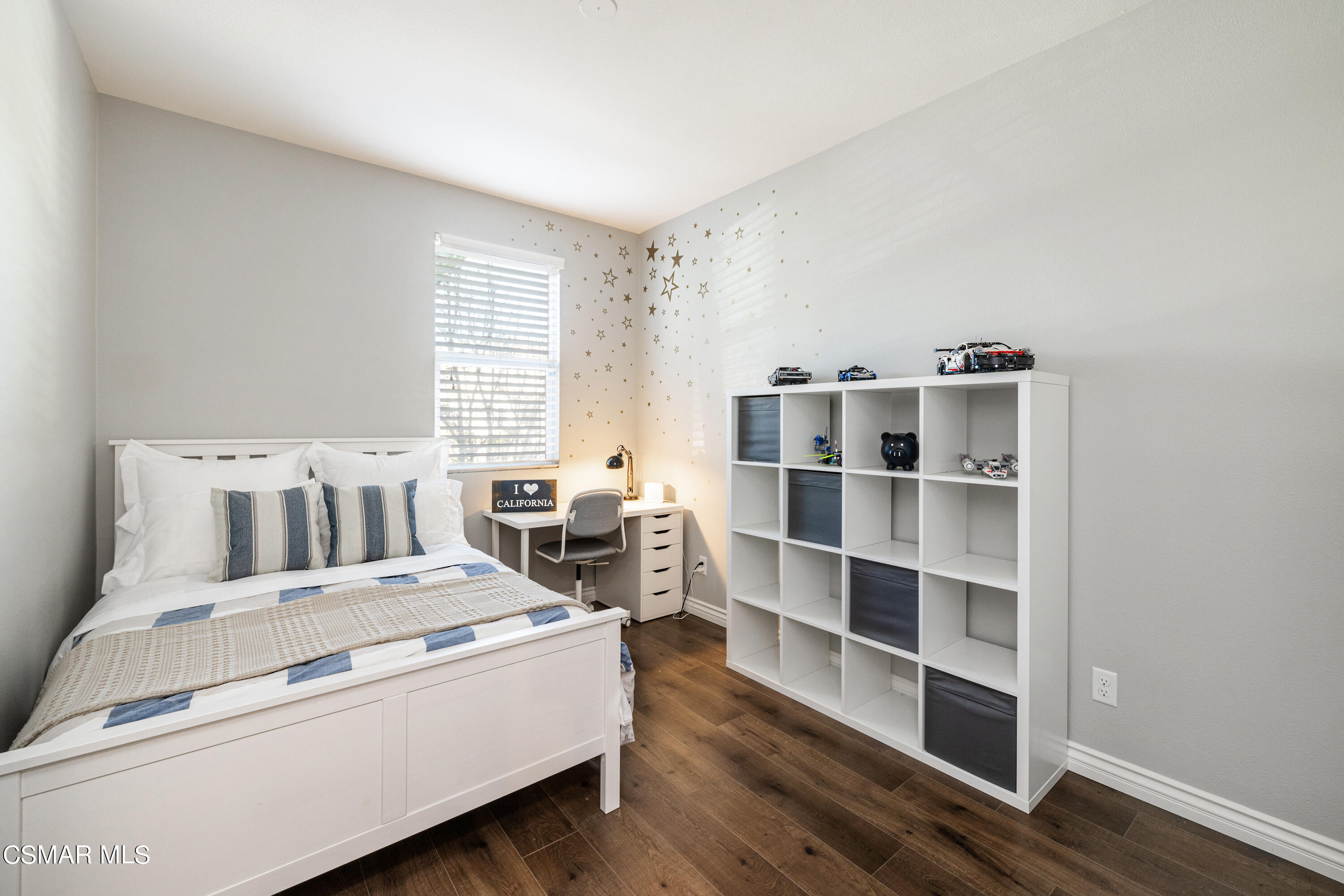 396 Edgewood Drive Fillmore, CA 93015 - Photo 17 of 29 a living room with furniture cabinets and a window