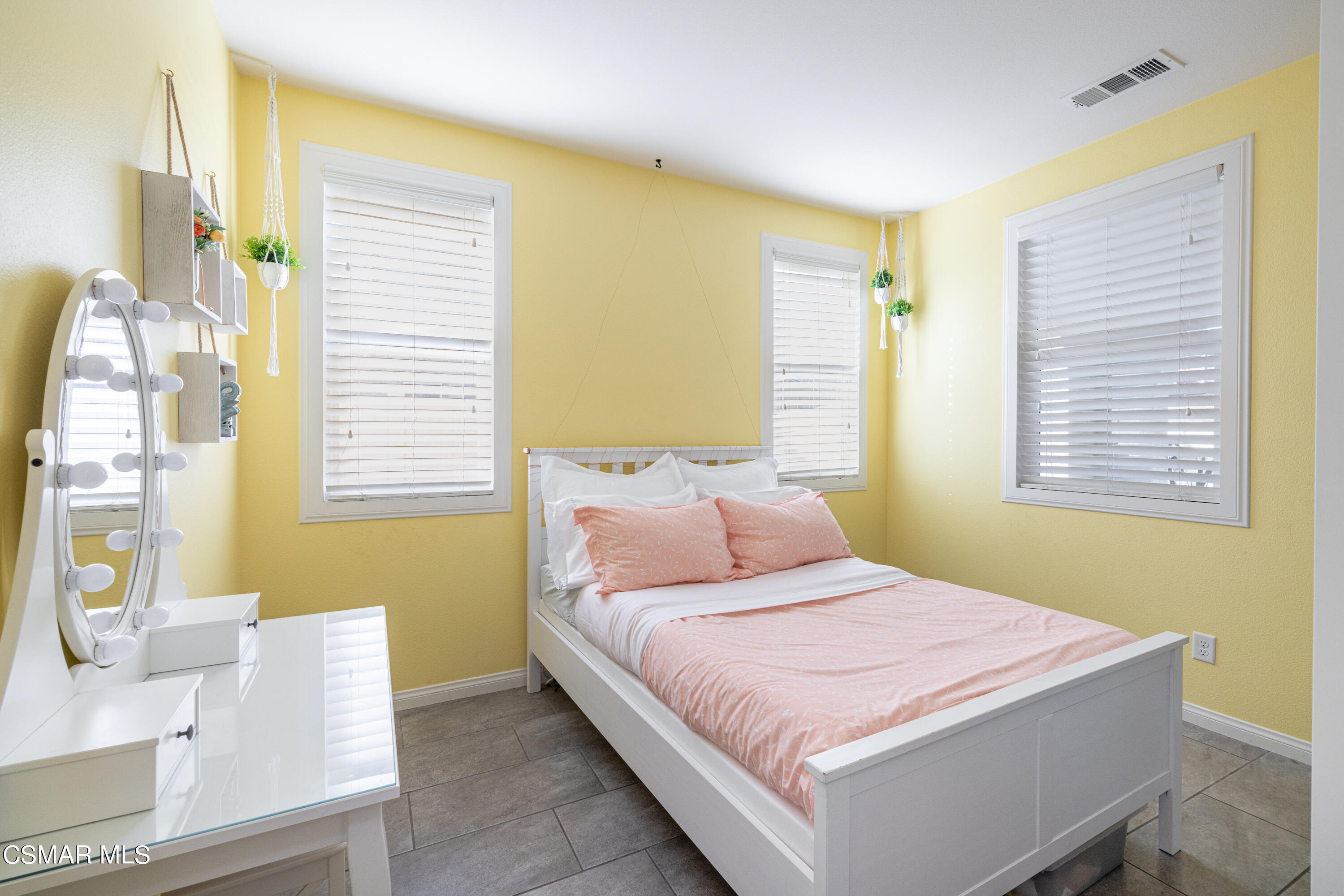 396 Edgewood Drive Fillmore, CA 93015 - Photo 18 of 29 a bedroom with a bed and a couch