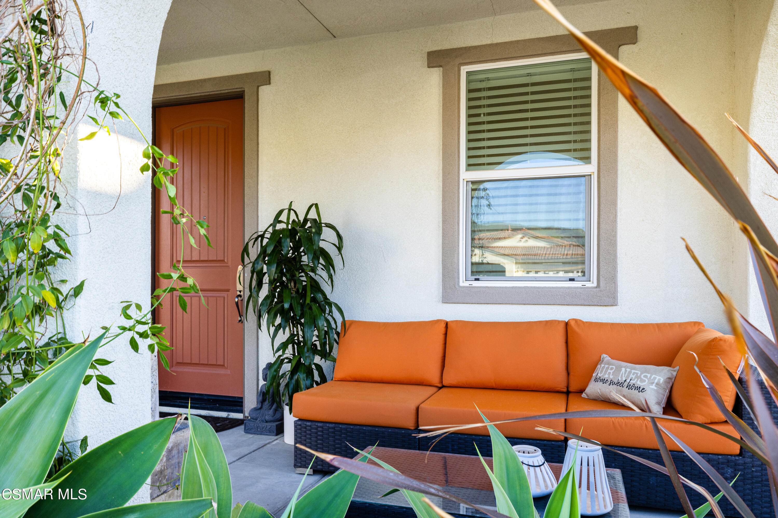 396 Edgewood Drive Fillmore, CA 93015 - Photo 3 of 29 a backyard of a house with seating space