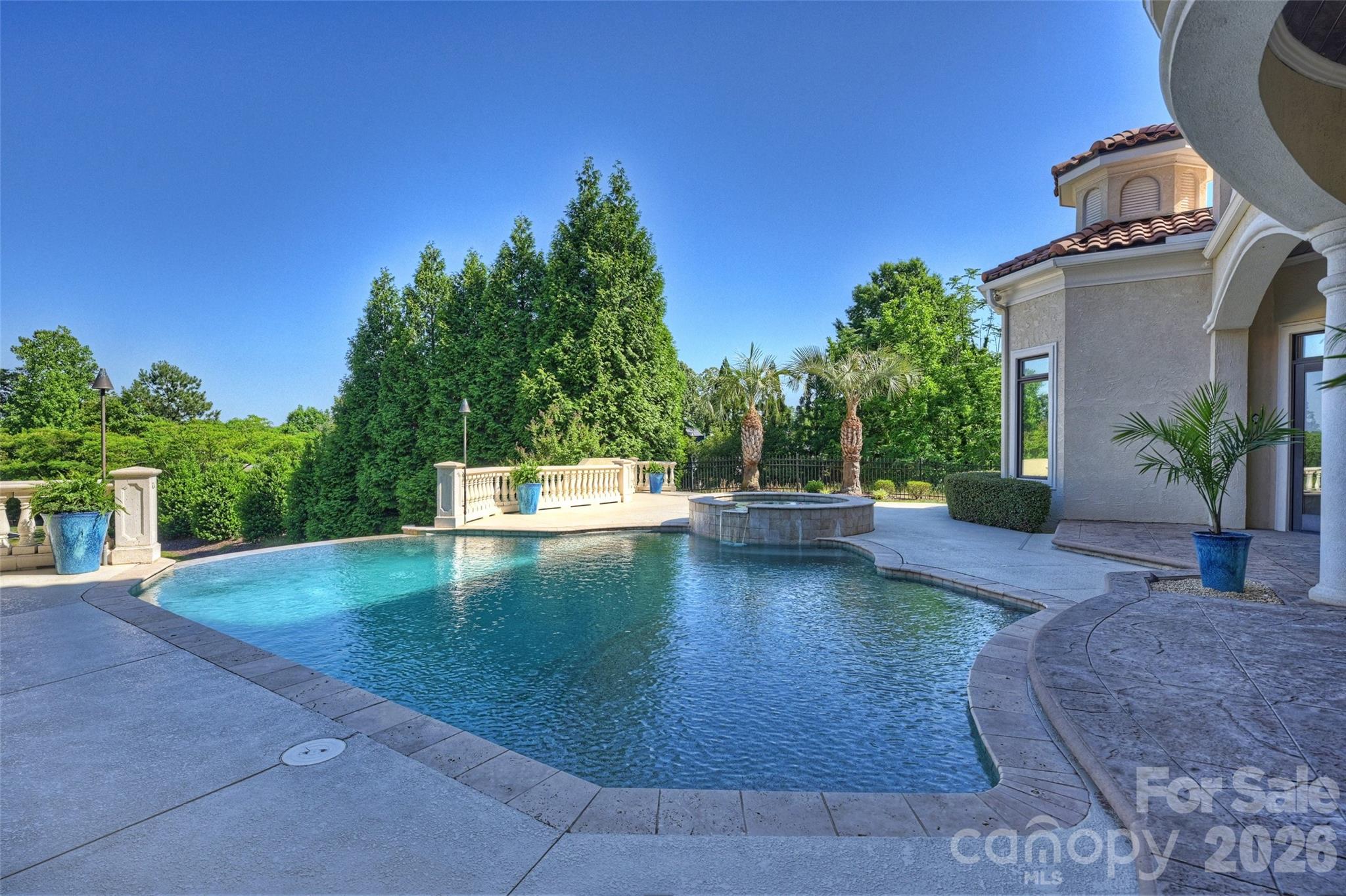 18394 Nantz Road Cornelius, NC 28031 - Photo 20 of 47 a view of a swimming pool with a patio