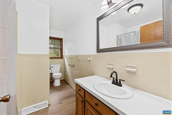 a bathroom with a sink and a toilet
