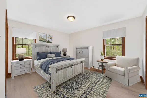 a bed room with a bed and a couch