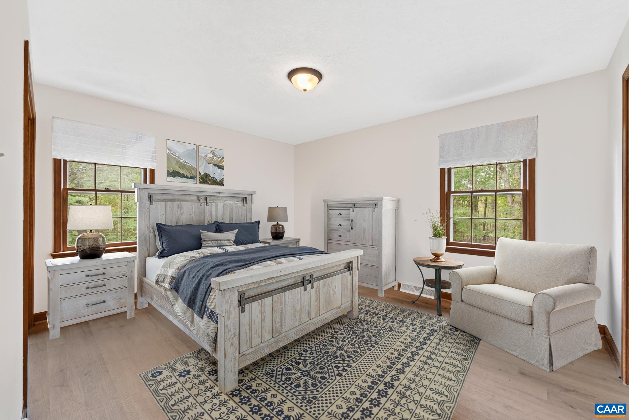 55 Watson Road Ruckersville, VA 22968 - Photo 19 of 37 a bed room with a bed and a couch