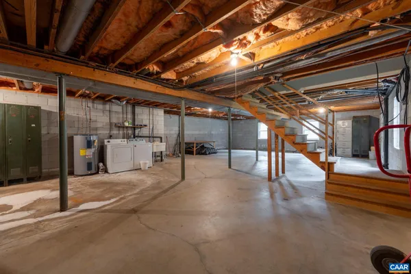 a view of a gym with wooden ceiling