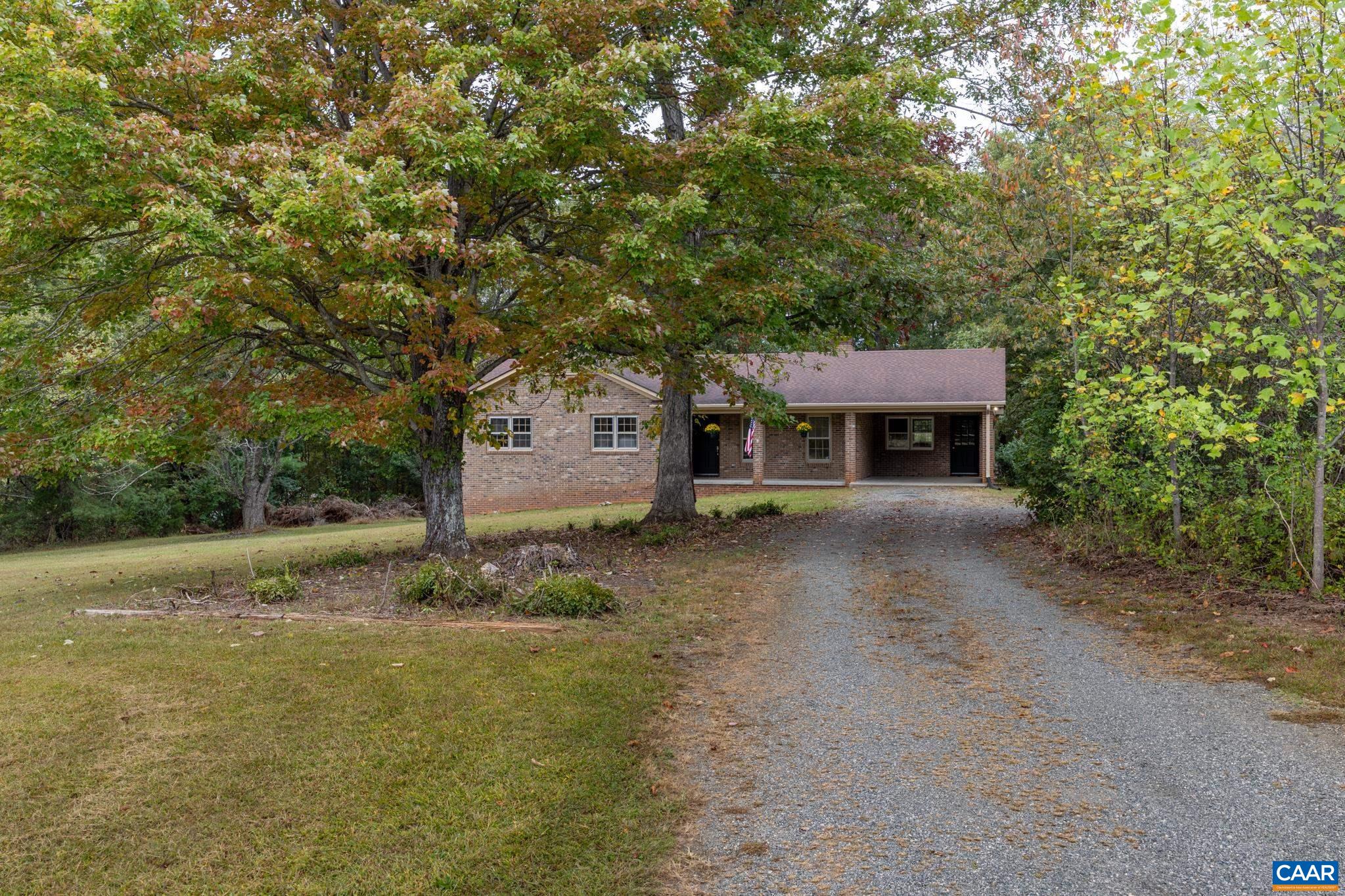 55 Watson Road Ruckersville, VA 22968 - Photo 33 of 37 a front view of a house with a yard