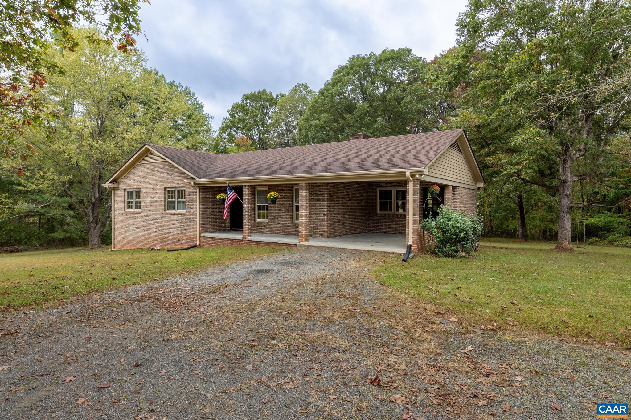 55 Watson Road Ruckersville, VA 22968 - Photo 35 of 37 a view of a house with a yard and large tree