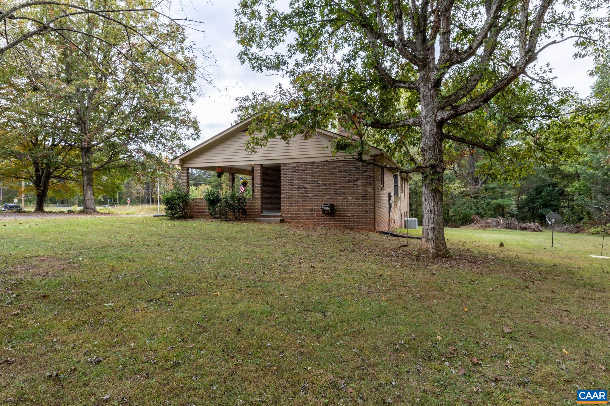 55 Watson Road Ruckersville, VA 22968 - Photo 36 of 37 a view of a house with a yard