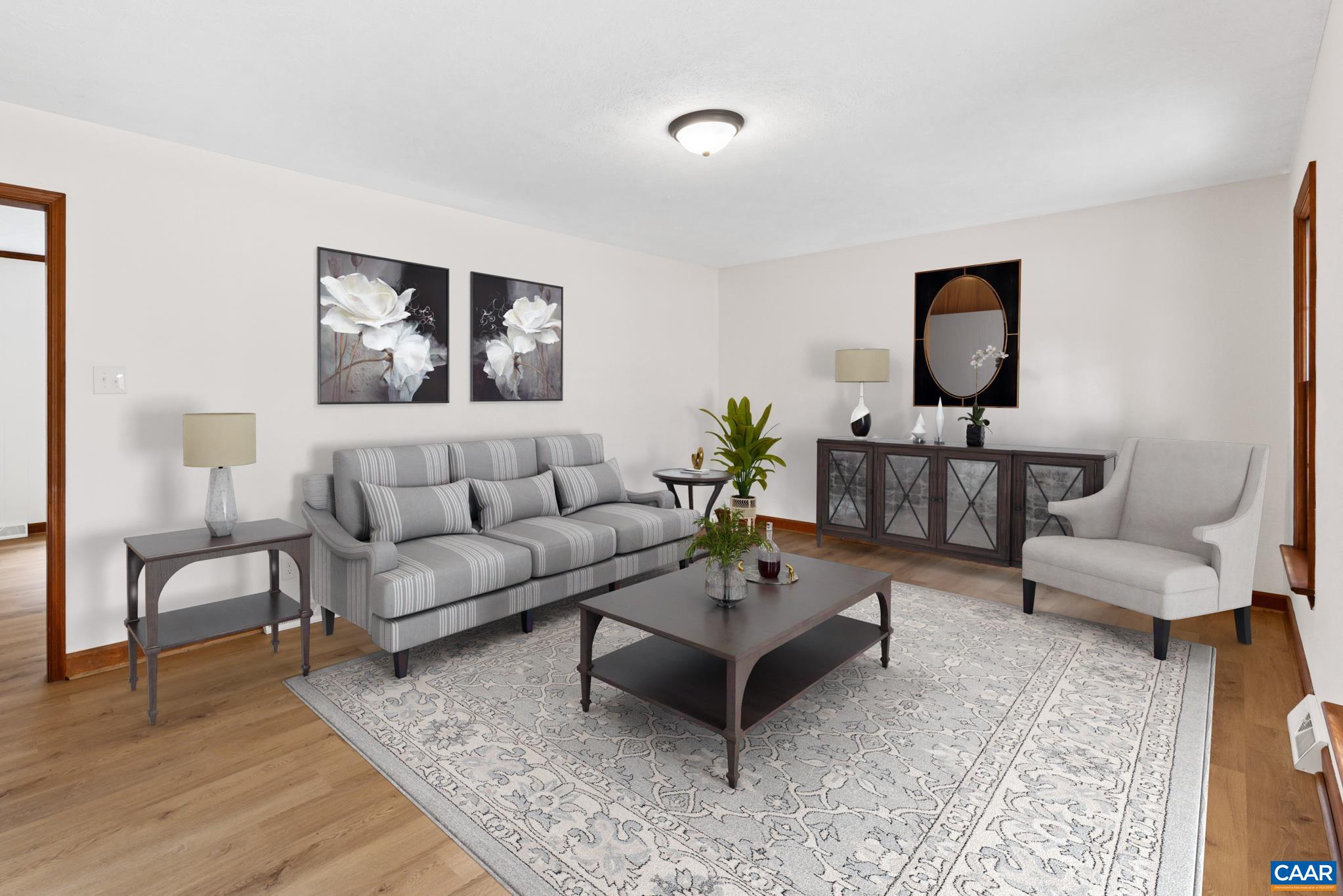 55 Watson Road Ruckersville, VA 22968 - Photo 7 of 37 a living room with furniture and a wooden floor