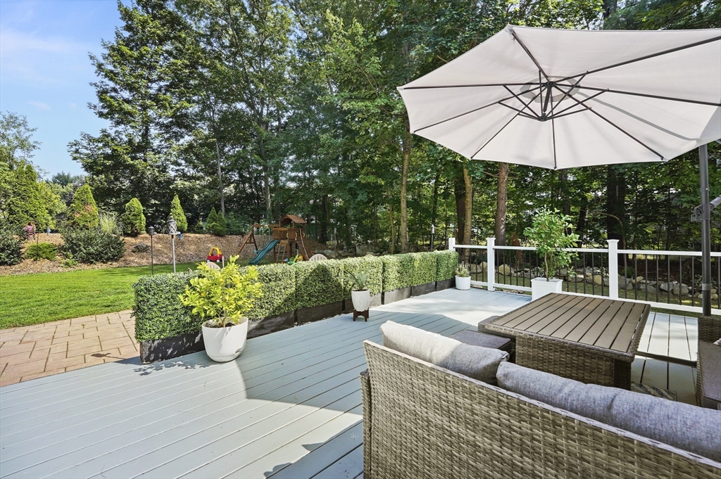 101 Prospect Street Acton, MA 01720 - Photo 15 of 21 a view of a patio with couches table and chairs
