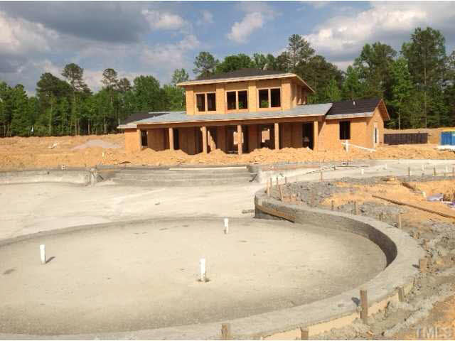 809 Wildflower Ridge Road Wake Forest, NC 27587 - Photo 7 of 9 Clubhouse and pool under construction and expected to be complete this pool season