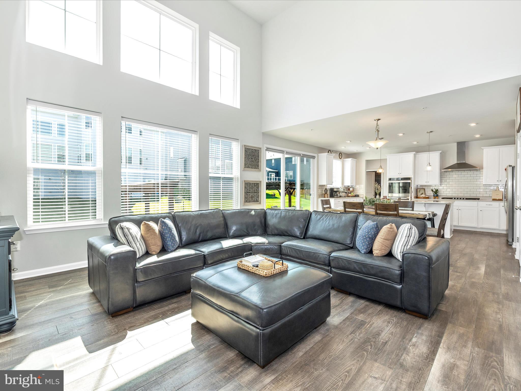 5816 Hawk Ridge Road Frederick, MD 21704 - Photo 12 of 97 a living room with furniture and a large window