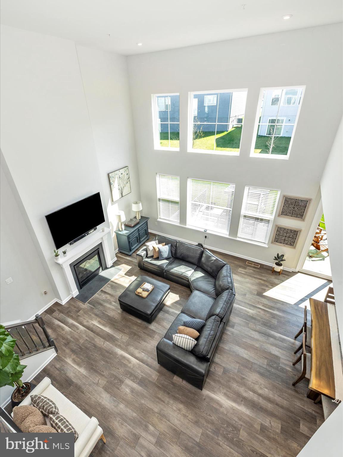 5816 Hawk Ridge Road Frederick, MD 21704 - Photo 13 of 97 a living room with furniture and a flat screen tv