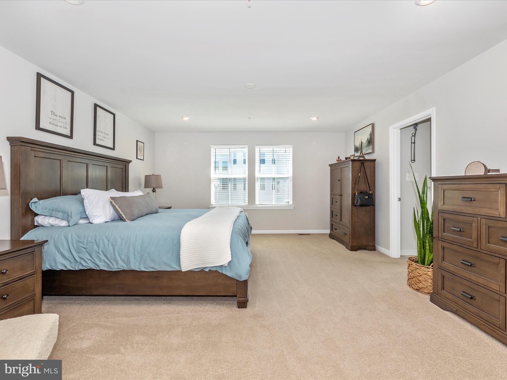 5816 Hawk Ridge Road Frederick, MD 21704 - Photo 23 of 97 a spacious bedroom with a bed and a window