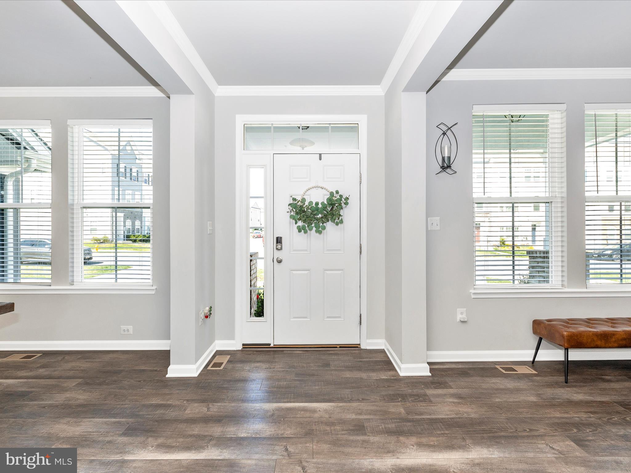 5816 Hawk Ridge Road Frederick, MD 21704 - Photo 3 of 97 an empty room with wooden floor and windows