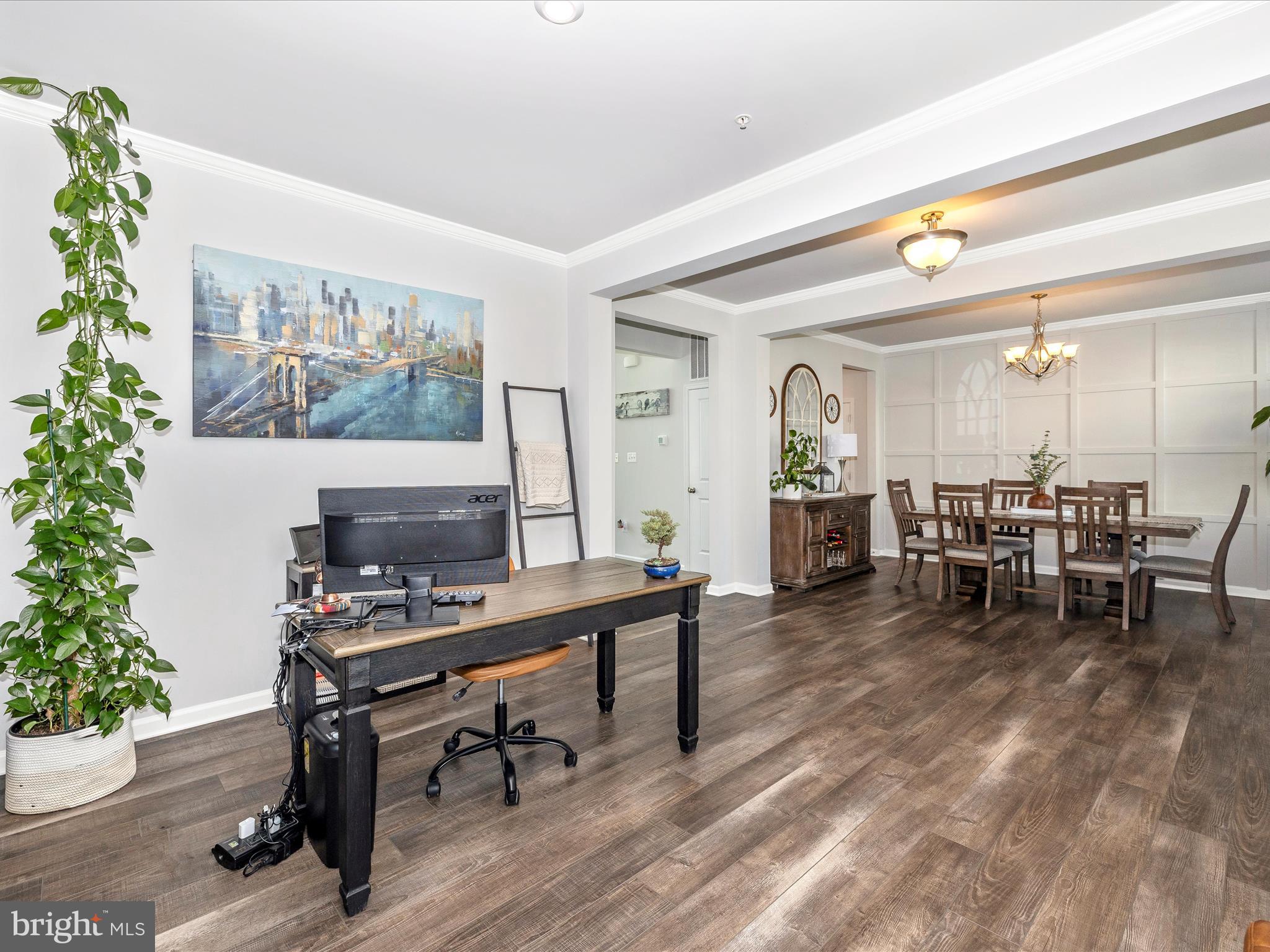5816 Hawk Ridge Road Frederick, MD 21704 - Photo 6 of 97 a view of a workspace with furniture and a potted plant