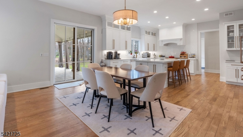 7 Woodcrest Road Florham Park, NJ 07932 - Photo 13 of 50 a view of a dining room with furniture window and wooden floor