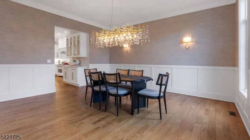 7 Woodcrest Road Florham Park, NJ 07932 - Photo 15 of 50 a view of a dining room with furniture and wooden floor