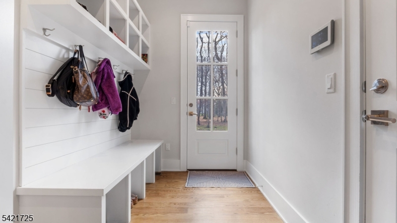7 Woodcrest Road Florham Park, NJ 07932 - Photo 19 of 50 a view of walk in closet with clothes and shoes
