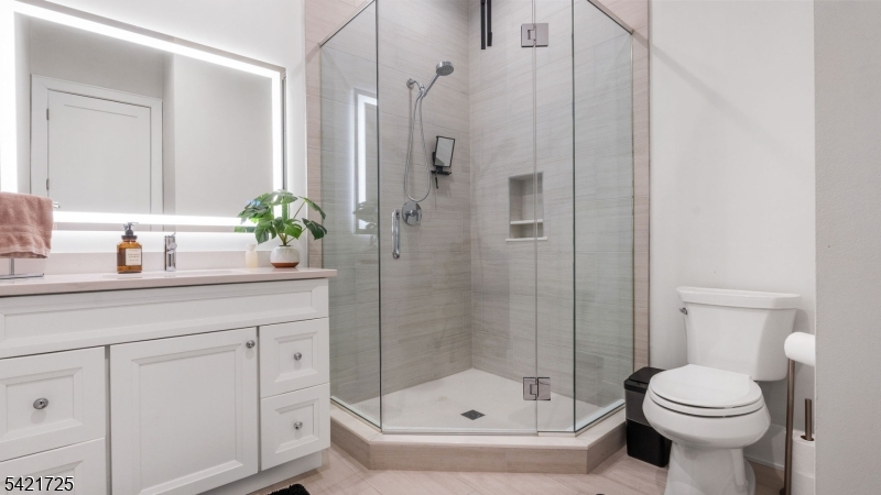 7 Woodcrest Road Florham Park, NJ 07932 - Photo 23 of 50 a bathroom with a shower a toilet and a sink