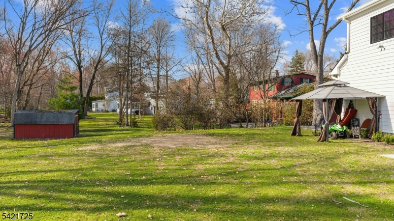 7 Woodcrest Road Florham Park, NJ 07932 - Photo 49 of 50 a view of a park with swings and a table
