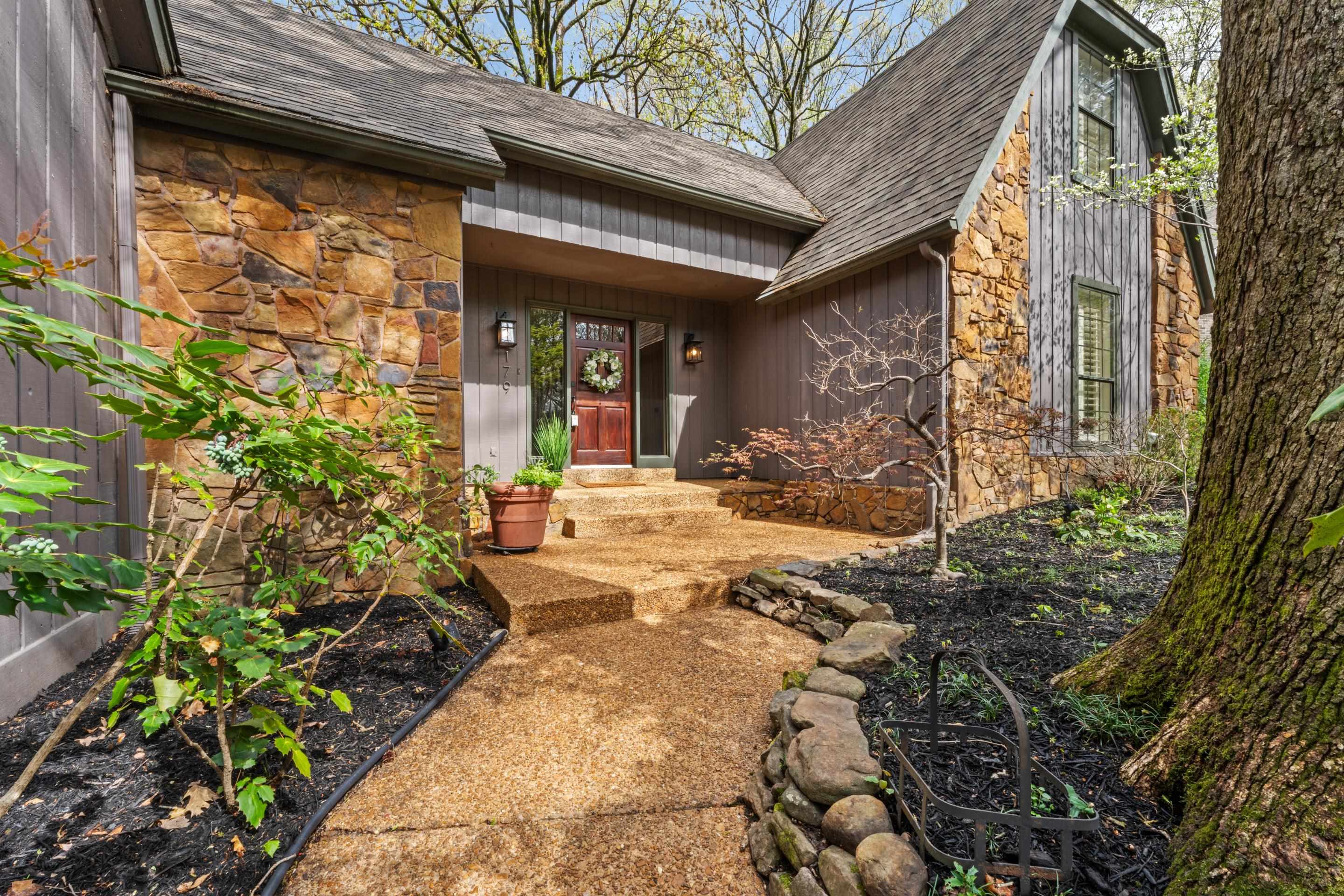 179 Ericson Road Memphis, TN 38018 - Photo 1 of 39 a view of yellow house with a yard