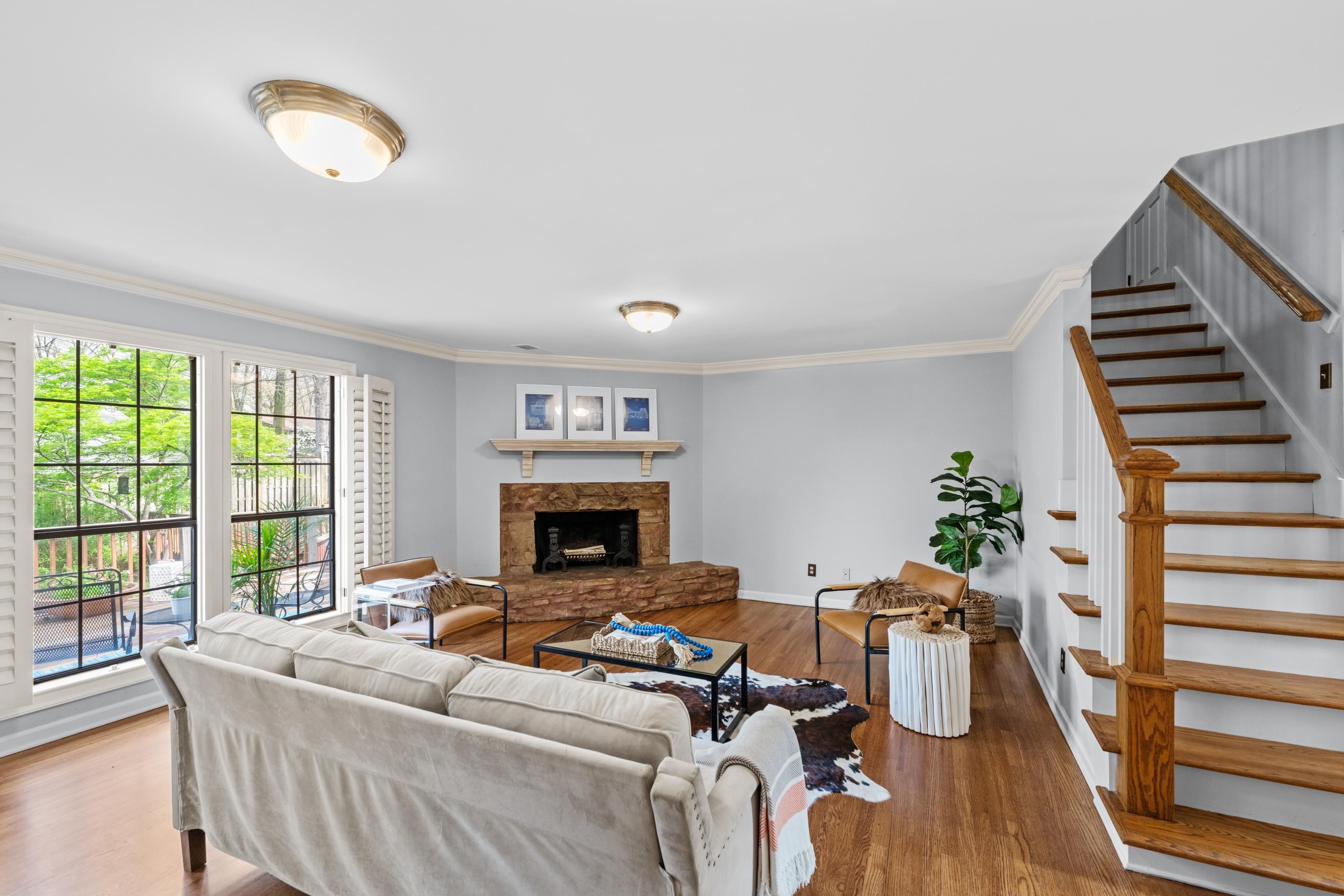 179 Ericson Road Memphis, TN 38018 - Photo 12 of 39 a living room with furniture and a fireplace