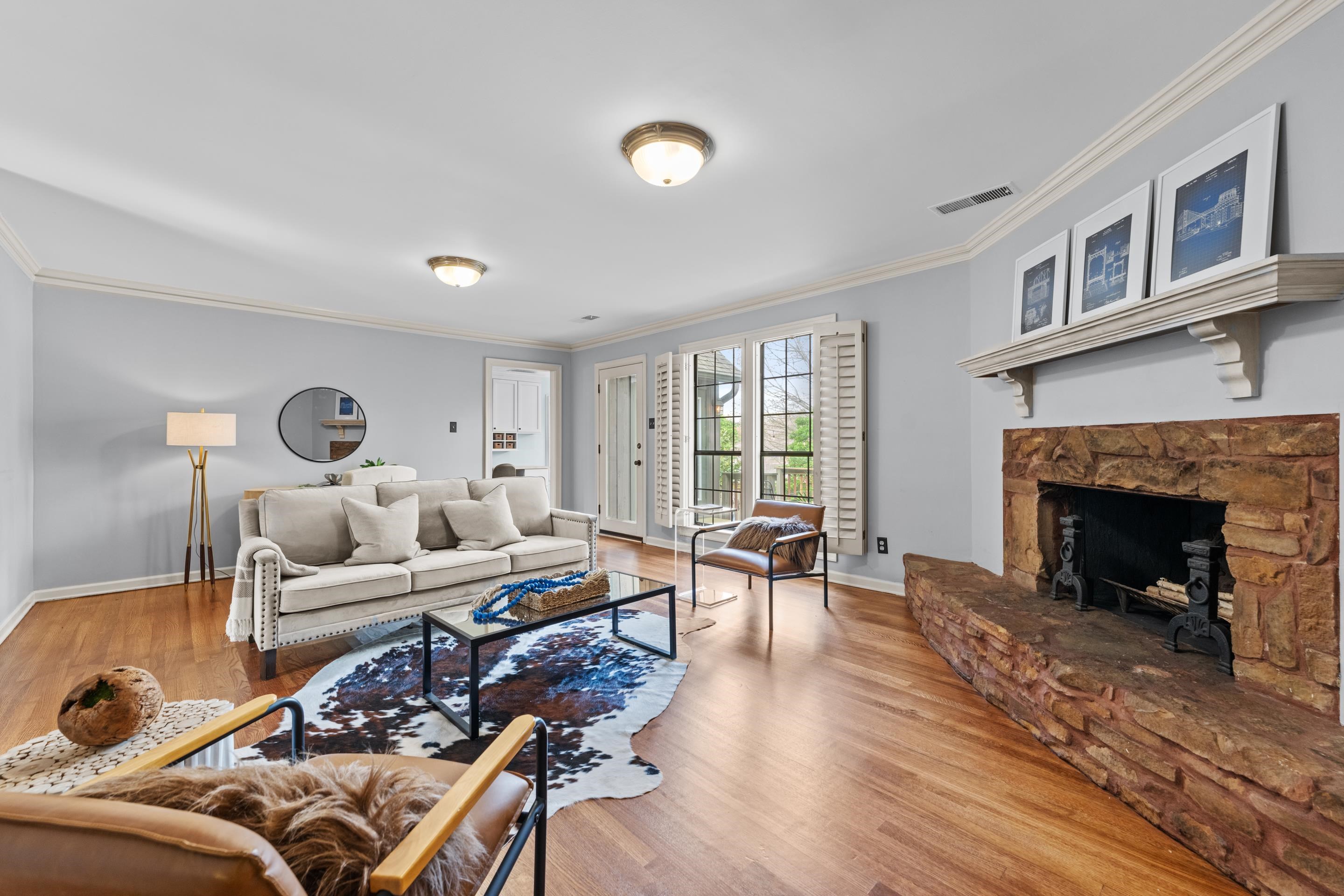 179 Ericson Road Memphis, TN 38018 - Photo 13 of 39 a living room with furniture and a fireplace