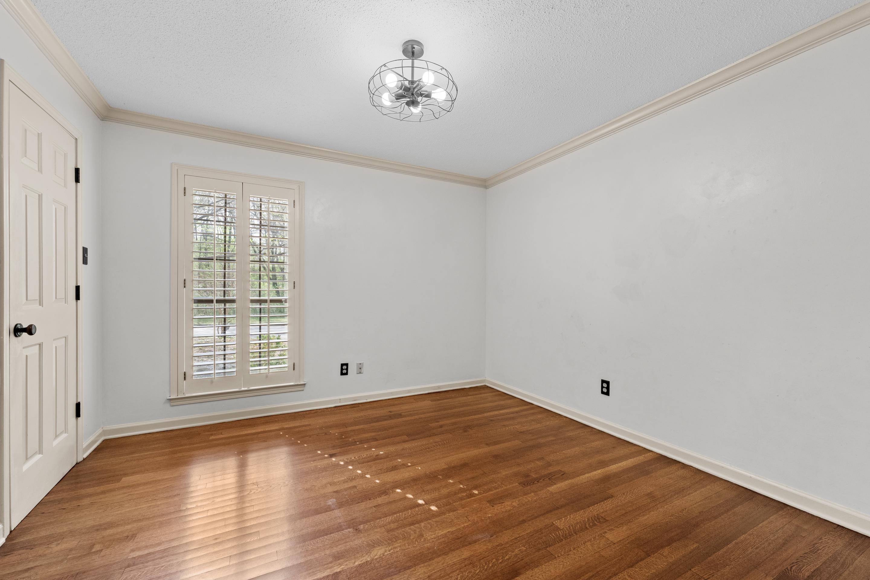 179 Ericson Road Memphis, TN 38018 - Photo 14 of 39 wooden floor in an empty room with a window