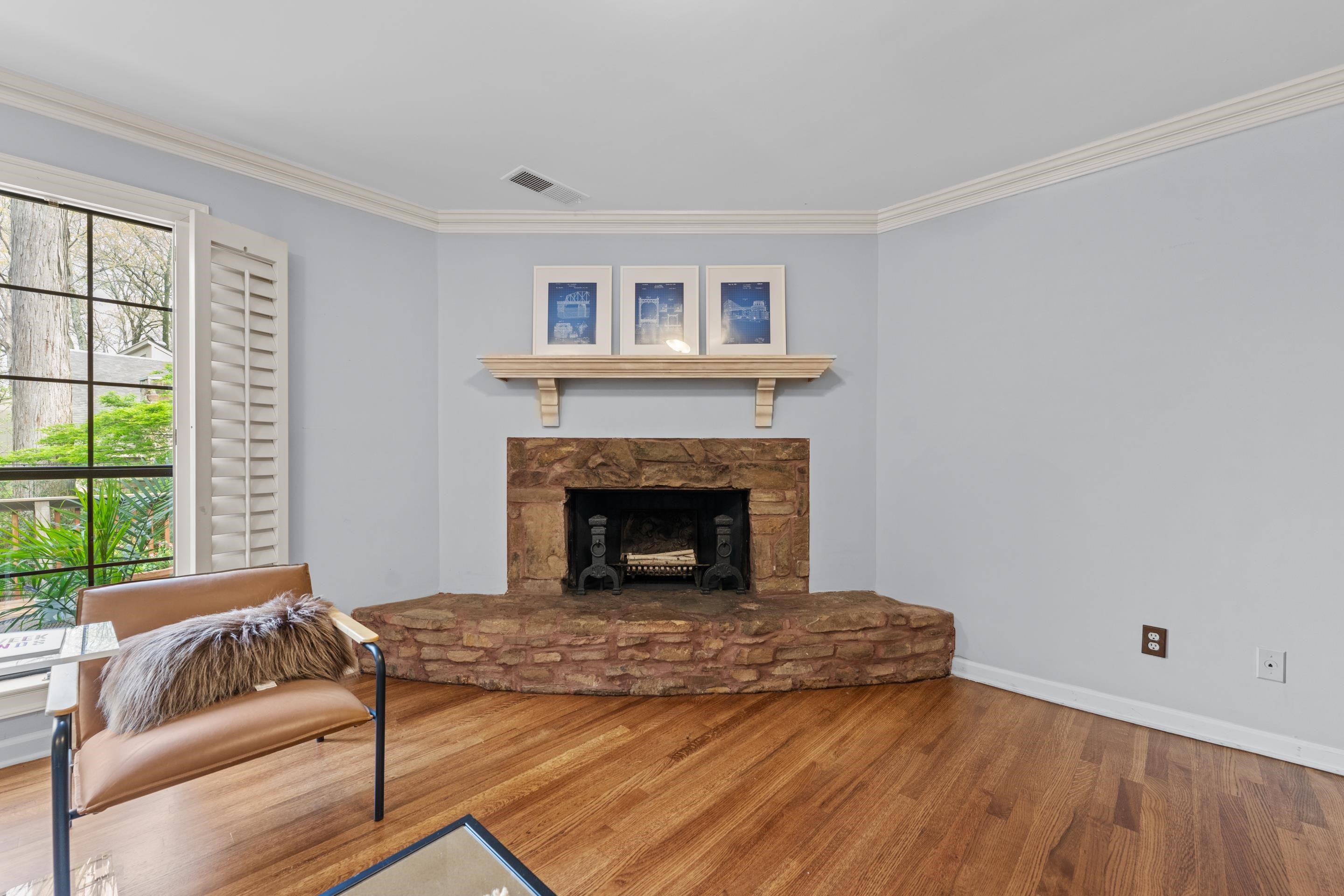 179 Ericson Road Memphis, TN 38018 - Photo 15 of 39 a living room with furniture and a fireplace