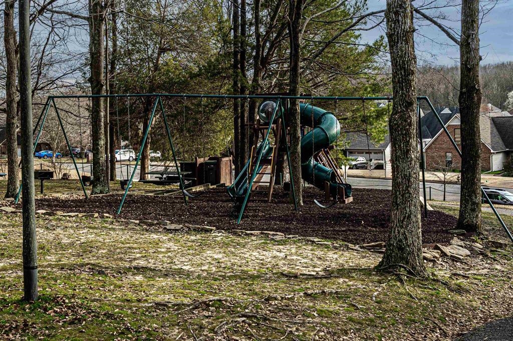 179 Ericson Road Memphis, TN 38018 - Photo 39 of 39 a view of a park with swings and slides