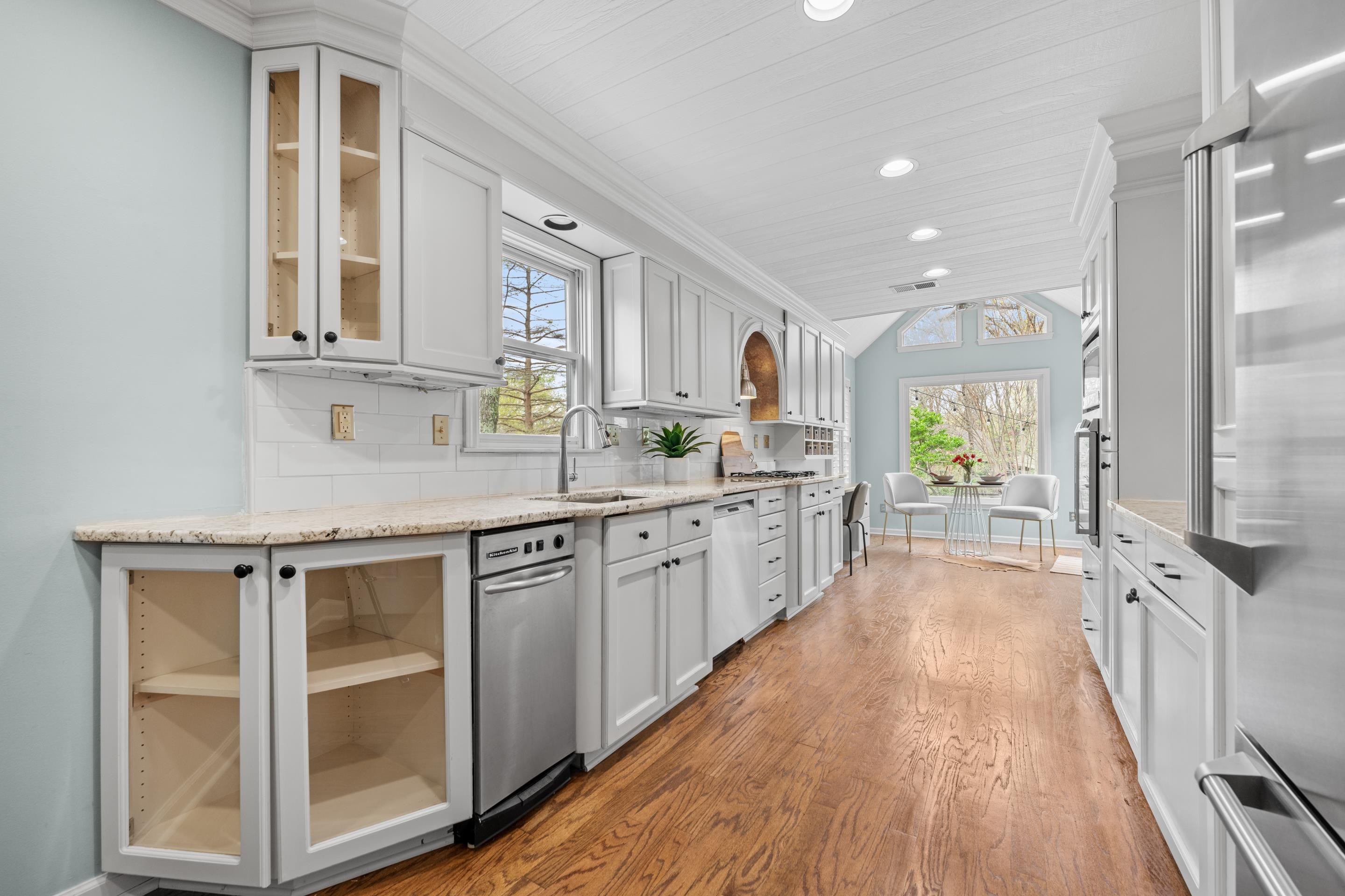 179 Ericson Road Memphis, TN 38018 - Photo 4 of 39 a large kitchen with a lot of counter space and a wooden floor