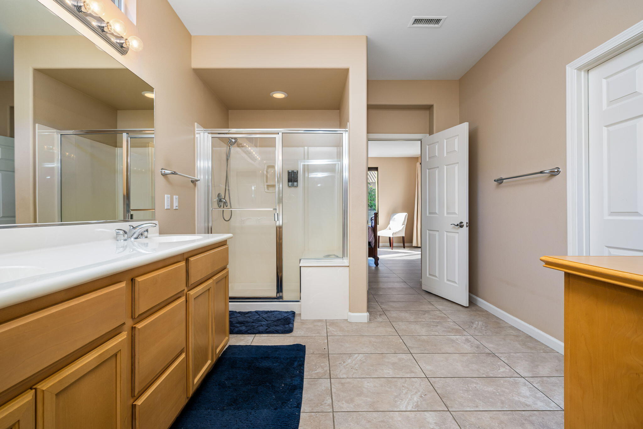 60237 Angora Court La Quinta, CA 92253 - Photo 22 of 75 a bathroom with a sink a toilet and shower