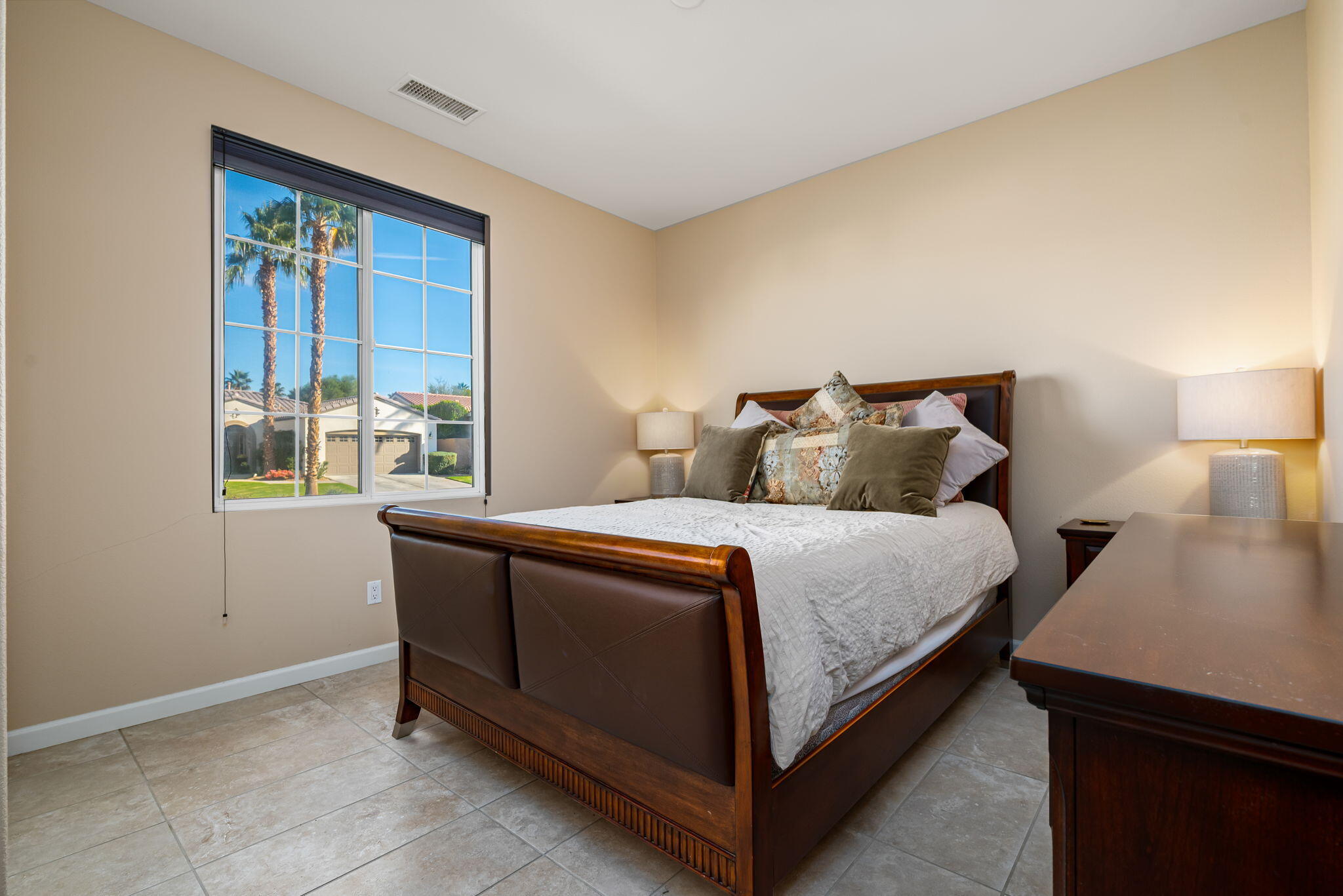 60237 Angora Court La Quinta, CA 92253 - Photo 24 of 75 a bedroom with a bed and window