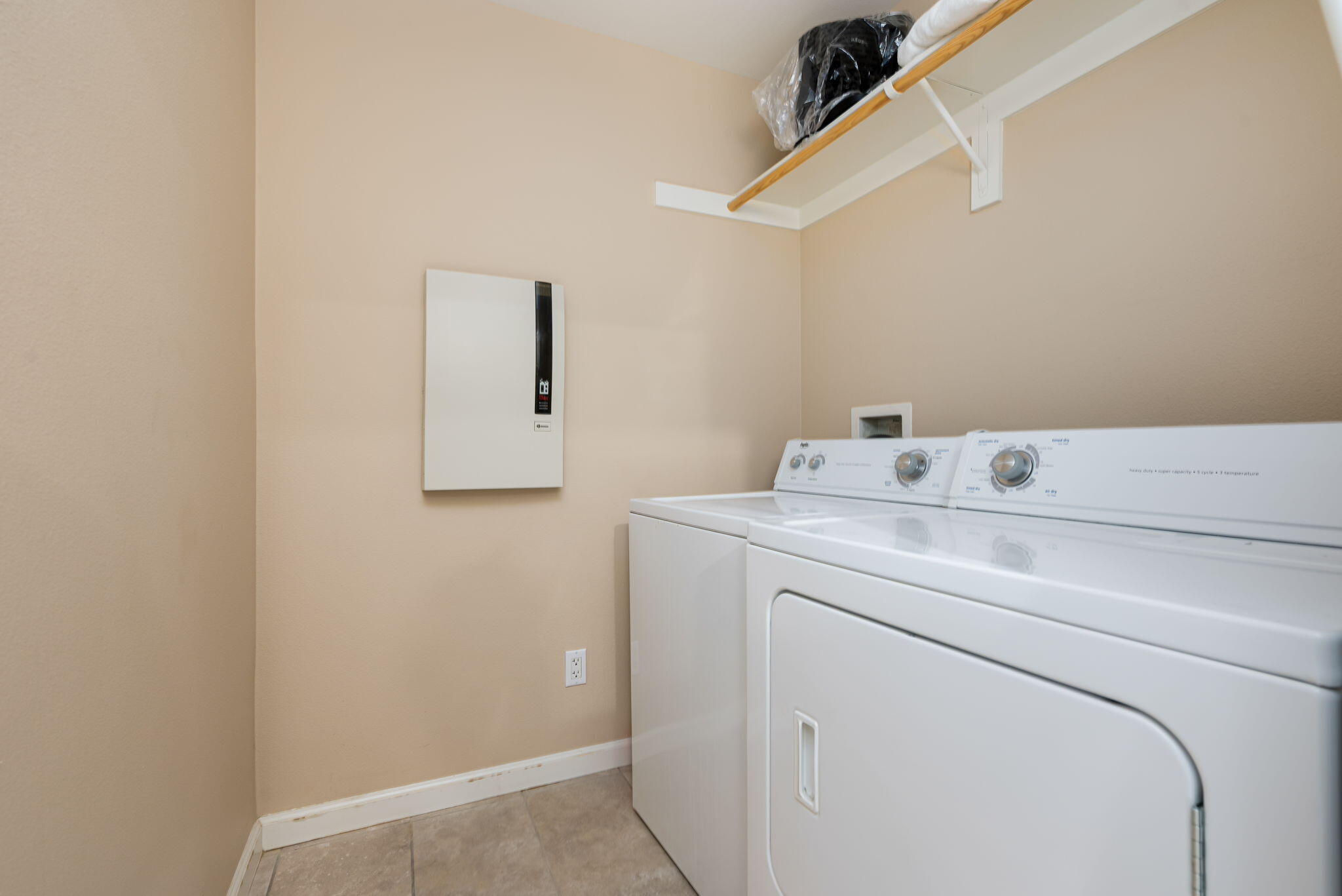 60237 Angora Court La Quinta, CA 92253 - Photo 26 of 75 a utility room with dryer and washer