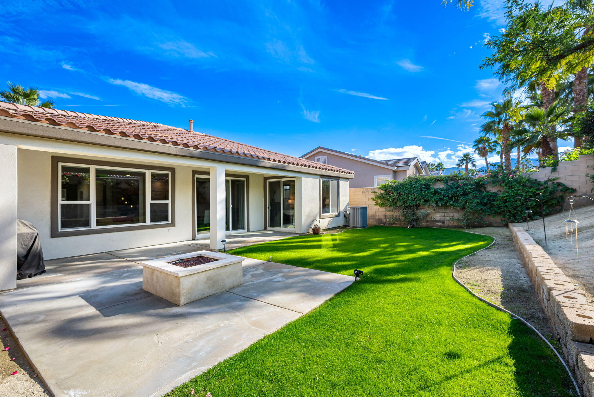 60237 Angora Court La Quinta, CA 92253 - Photo 29 of 75 a front view of a house with garden and porch