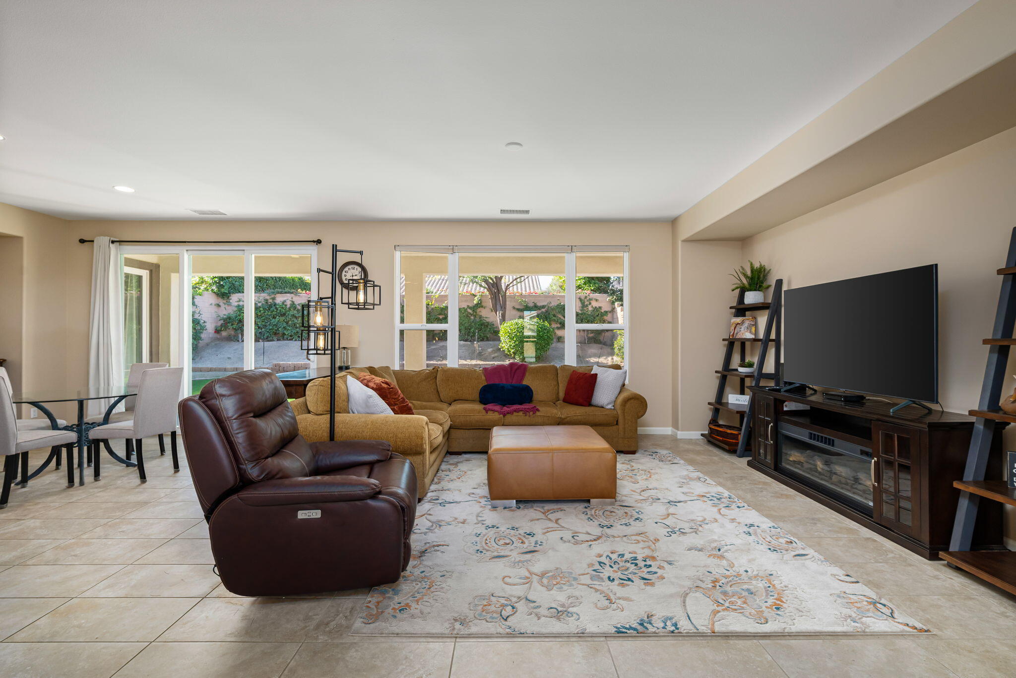 60237 Angora Court La Quinta, CA 92253 - Photo 6 of 75 a living room with furniture and a flat screen tv