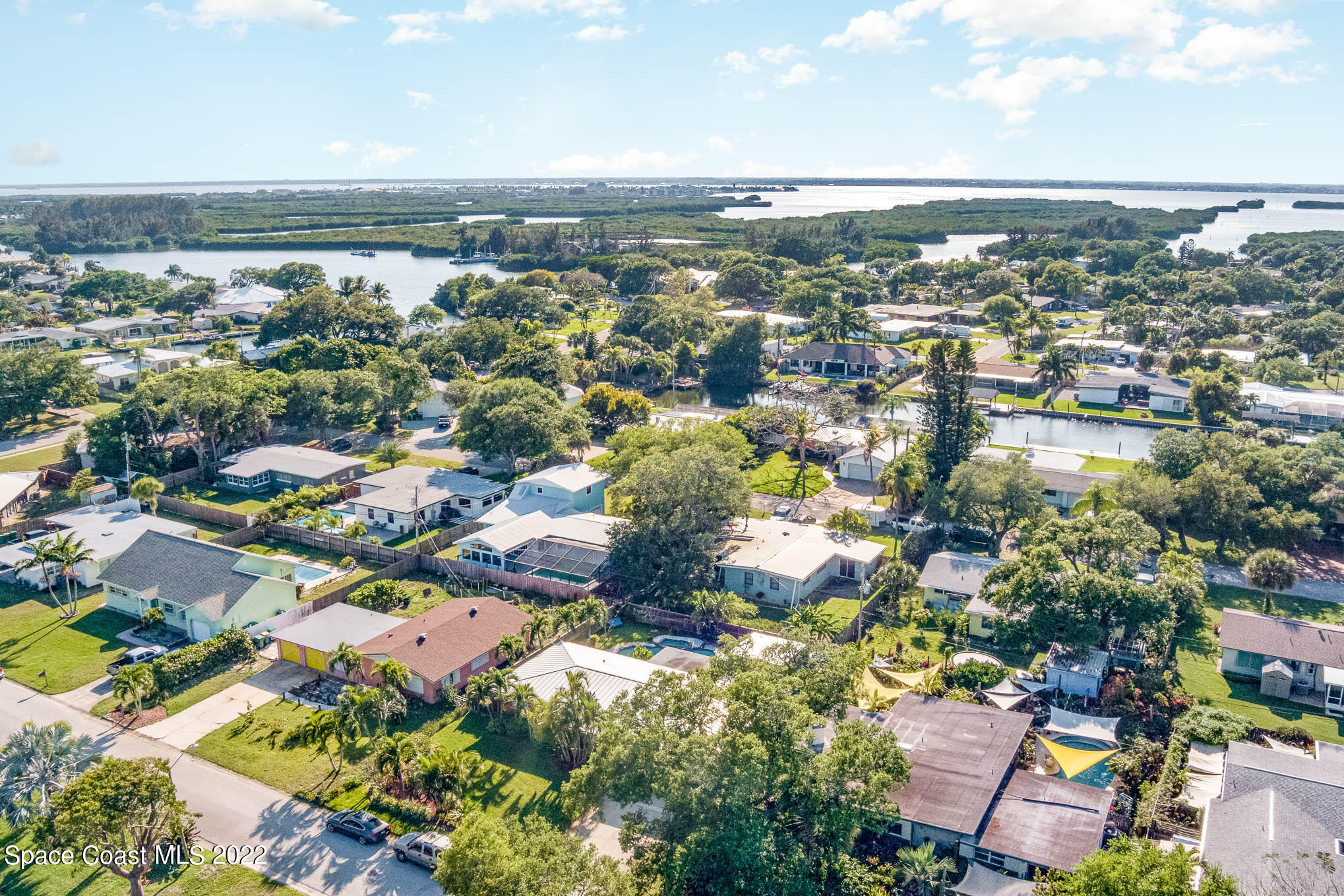 947 Santa Cruz Road Cocoa Beach, FL 32931 - Photo 27 of 29 an aerial view of residential building and lake