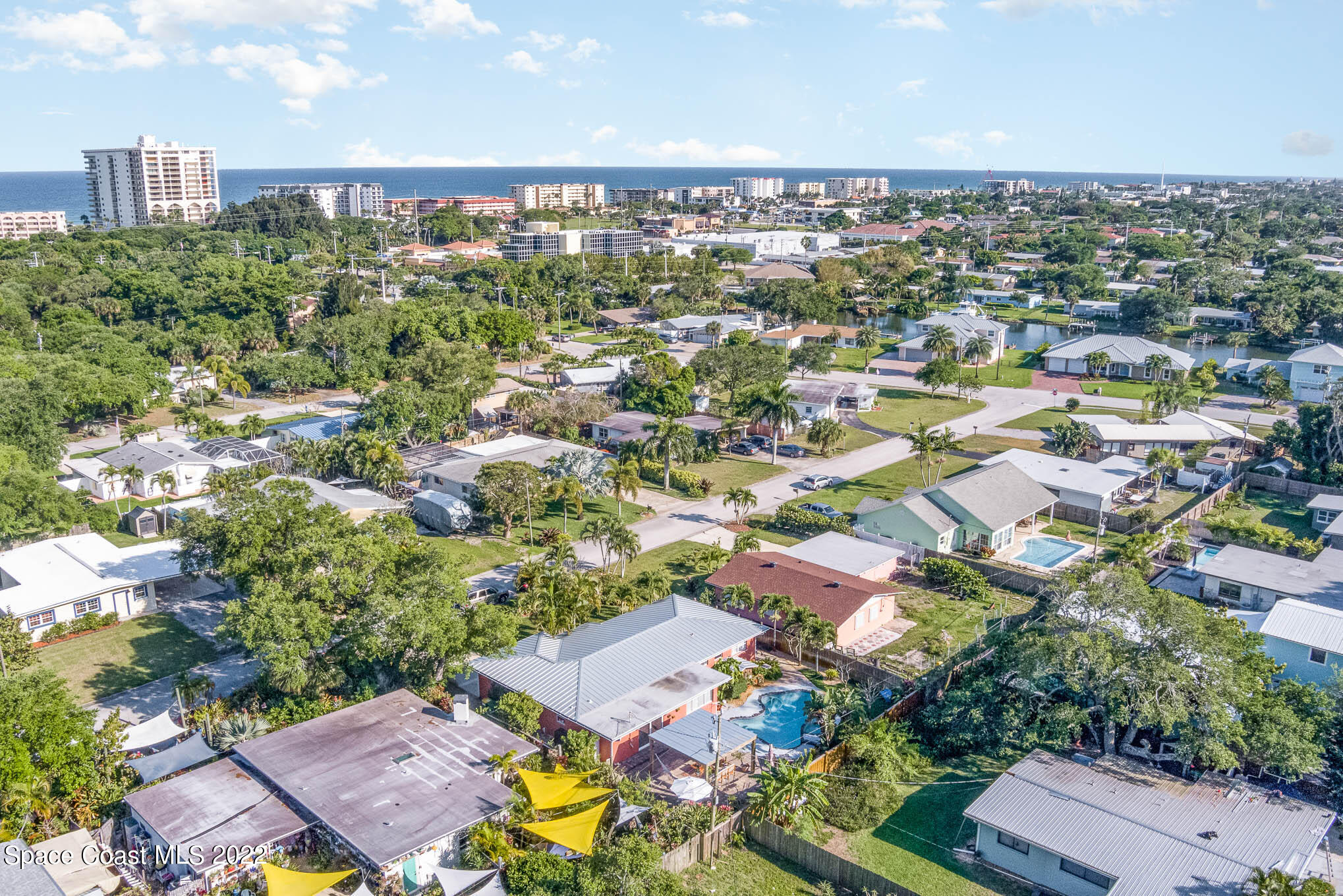 947 Santa Cruz Road Cocoa Beach, FL 32931 - Photo 4 of 29 an aerial view of multiple house