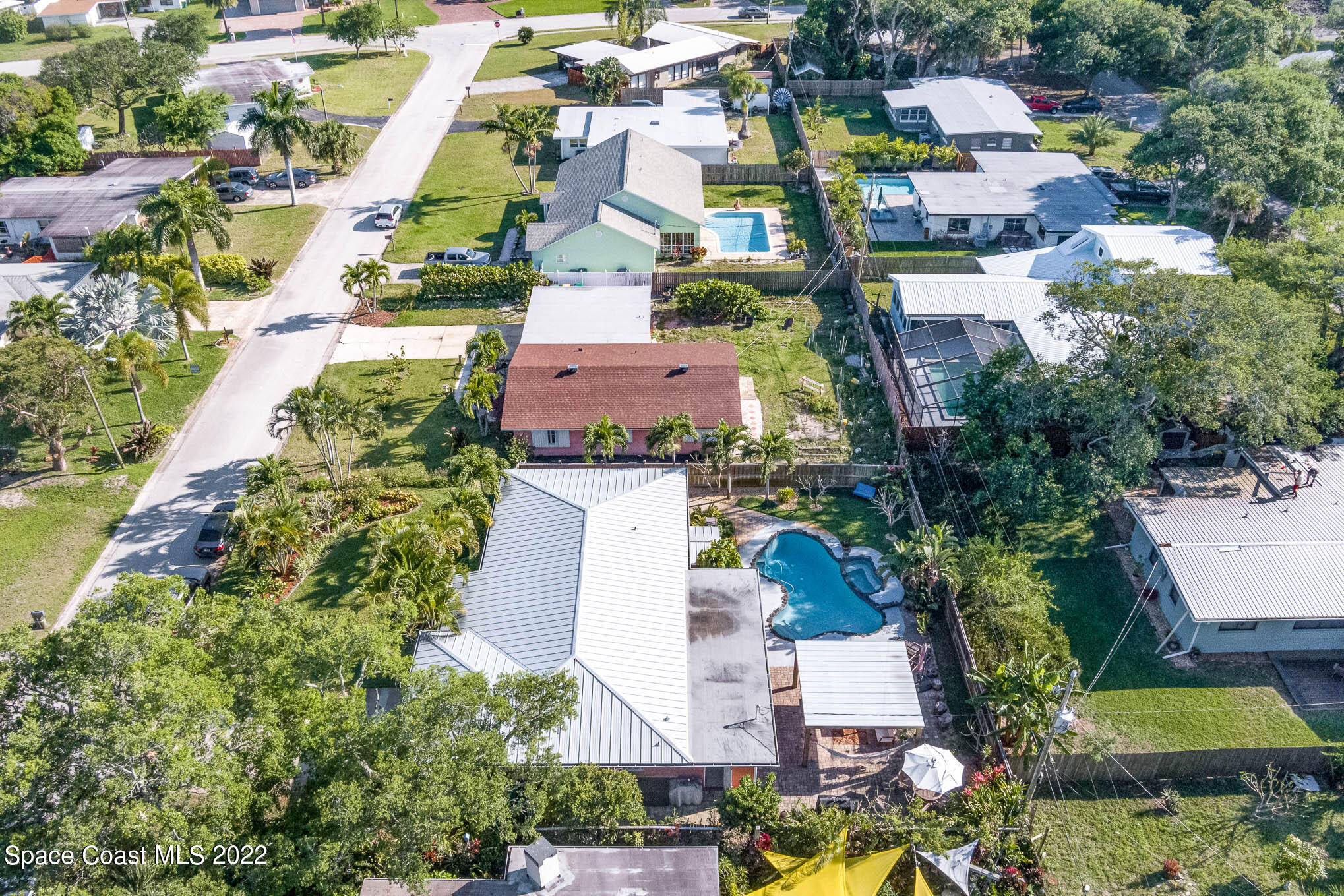 947 Santa Cruz Road Cocoa Beach, FL 32931 - Photo 6 of 29 an aerial view of residential houses with outdoor space
