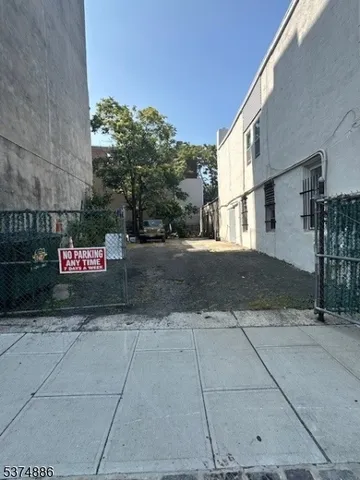 a view of a street with seating area