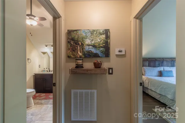 a en suite bathroom with a sink and a mirror
