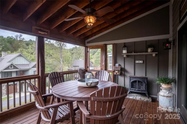 a view of a dining room with furniture window and outside view