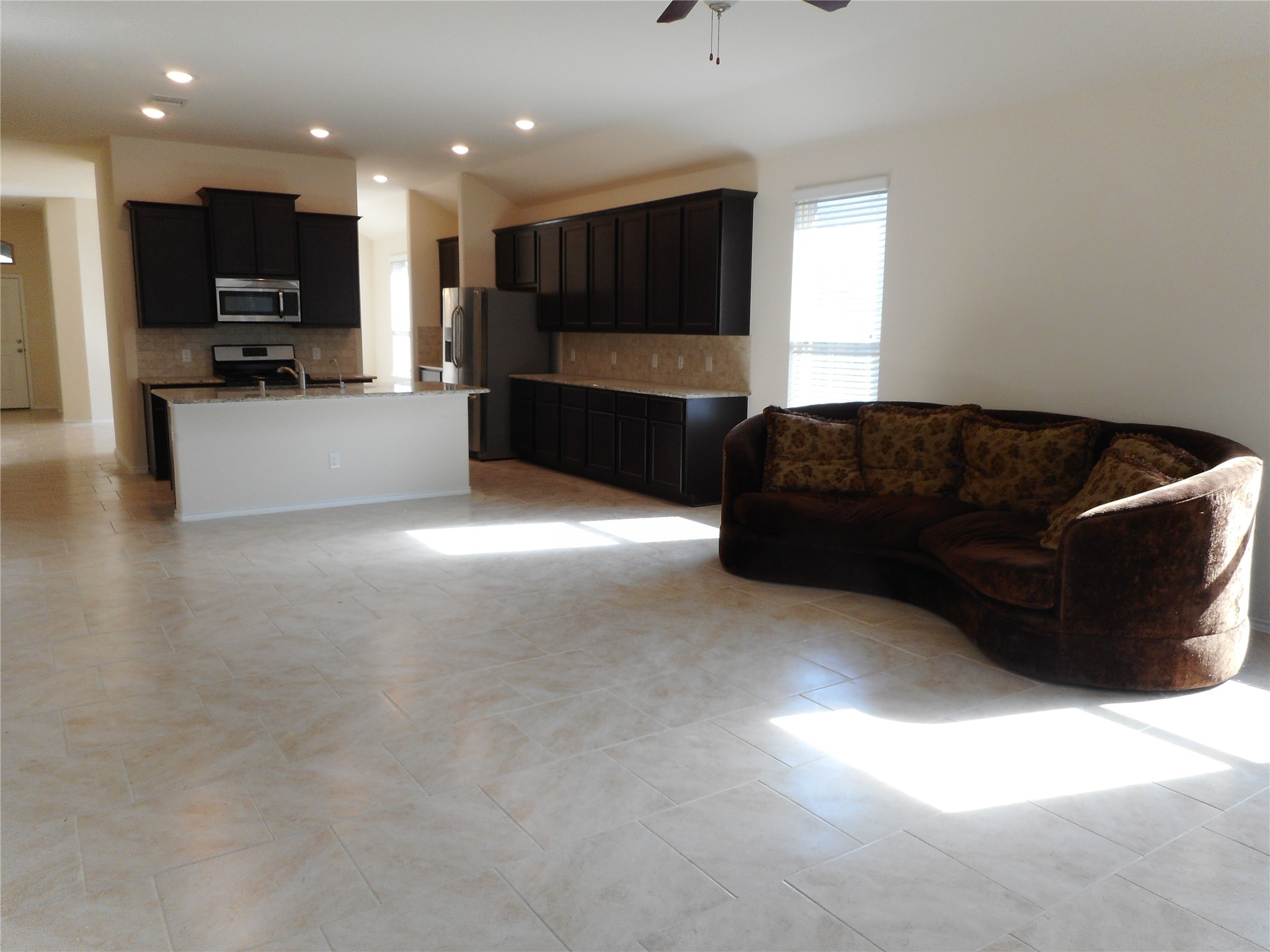 14021 Buffalo Gap Trail Conroe, TX 77384 - Photo 12 of 20 a living room with furniture and a flat screen tv