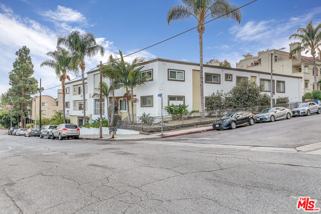 1837 North La Brea Avenue, Unit 2 Los Angeles, CA 90046 - Photo 19 of 19 a front view of a house with a yard and outdoor seating