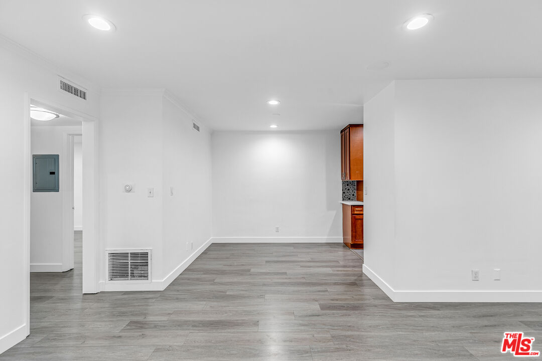 1837 North La Brea Avenue, Unit 2 Los Angeles, CA 90046 - Photo 4 of 19 a view of an empty room with wooden floor