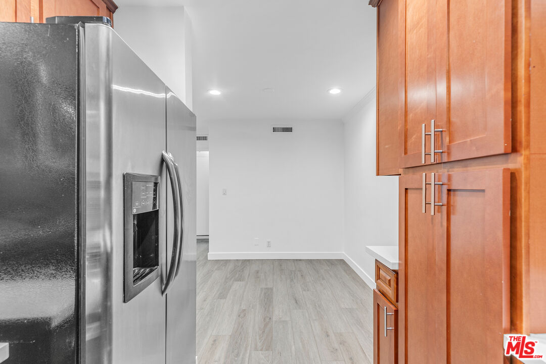 1837 North La Brea Avenue, Unit 2 Los Angeles, CA 90046 - Photo 6 of 19 an empty room with wooden floor