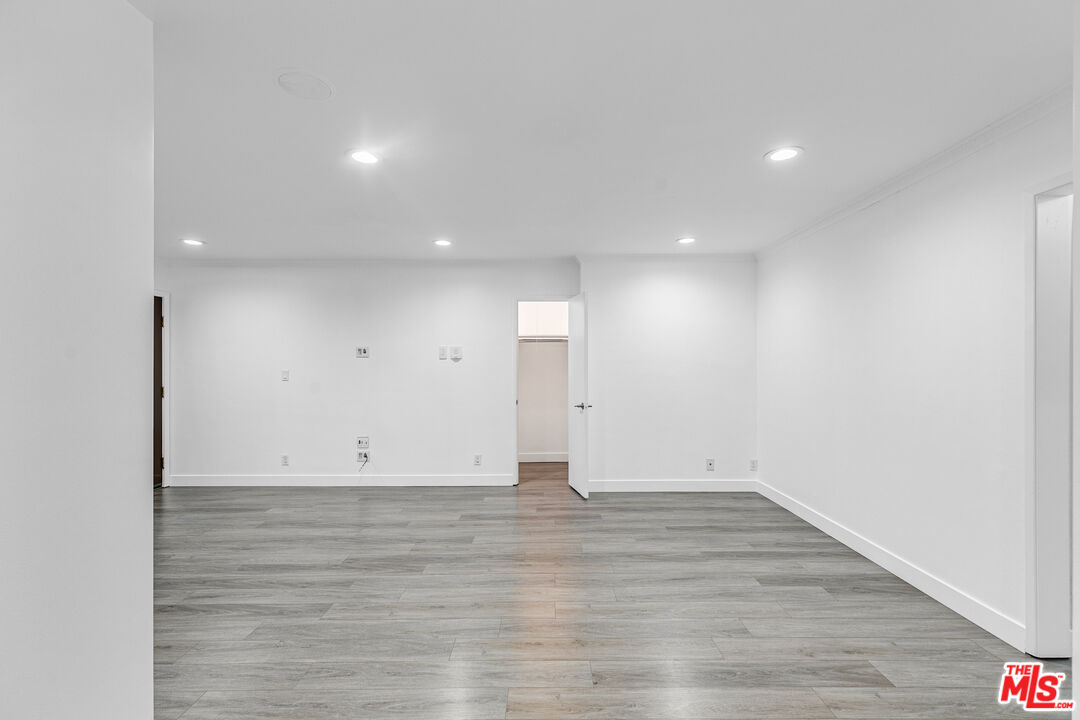 1837 North La Brea Avenue, Unit 2 Los Angeles, CA 90046 - Photo 9 of 19 a view of room with wooden floor