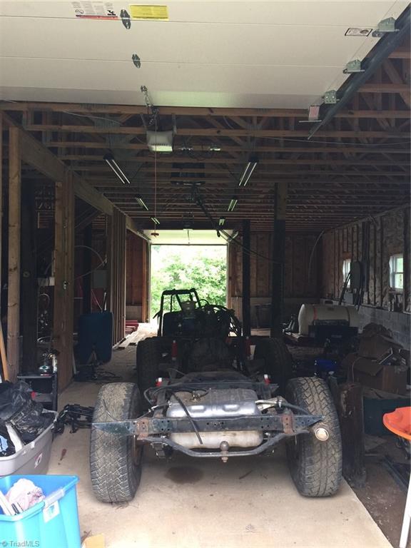 1020 Old Mail Rte Road King, NC 27021 - Photo 11 of 30 Building has a double pull through garage- upstairs is 1200 SF of space that could easily be inlaw quarters
