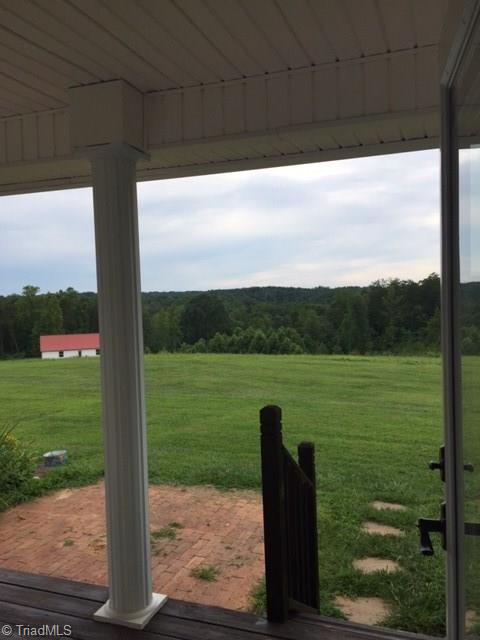 1020 Old Mail Rte Road King, NC 27021 - Photo 7 of 30 Doors off Master Bedroom lead to a porch and a view