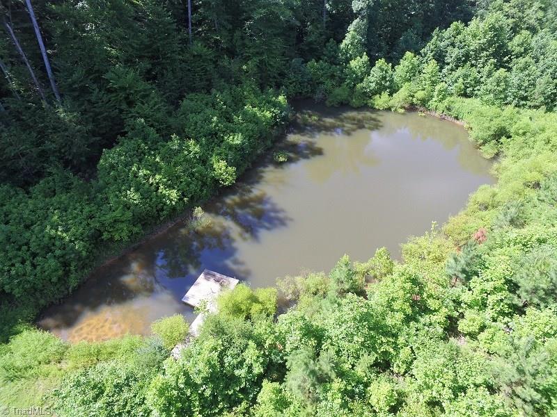 1020 Old Mail Rte Road King, NC 27021 - Photo 9 of 30 Stocked Pond w a dock has Channel Catfish, Largemouth Bass, Fathead Minnows, Brim, Bluegill and Crappie